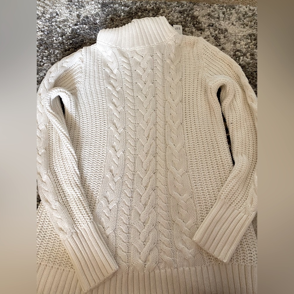 Brand new turtle neck sweater, knit looking material.